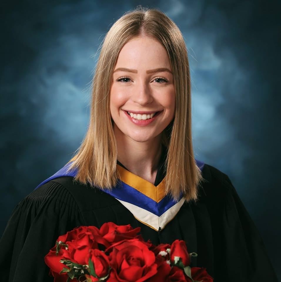 This image has an empty alt attribute; its file name is headshot_graduation-1.jpg